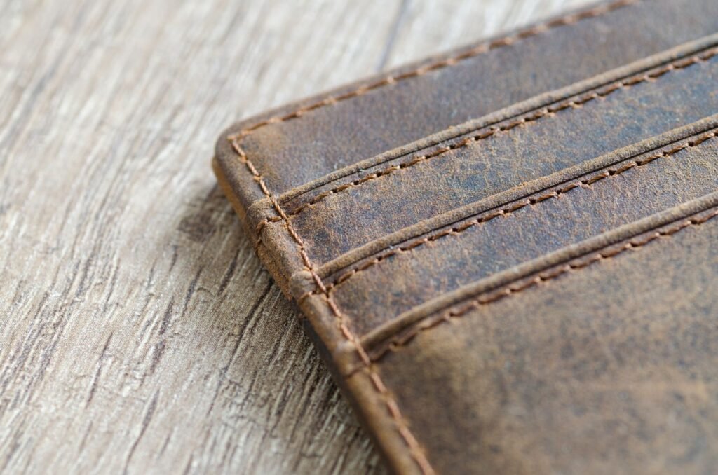 Detailed shot of a leather wallet showing an aged natural patina