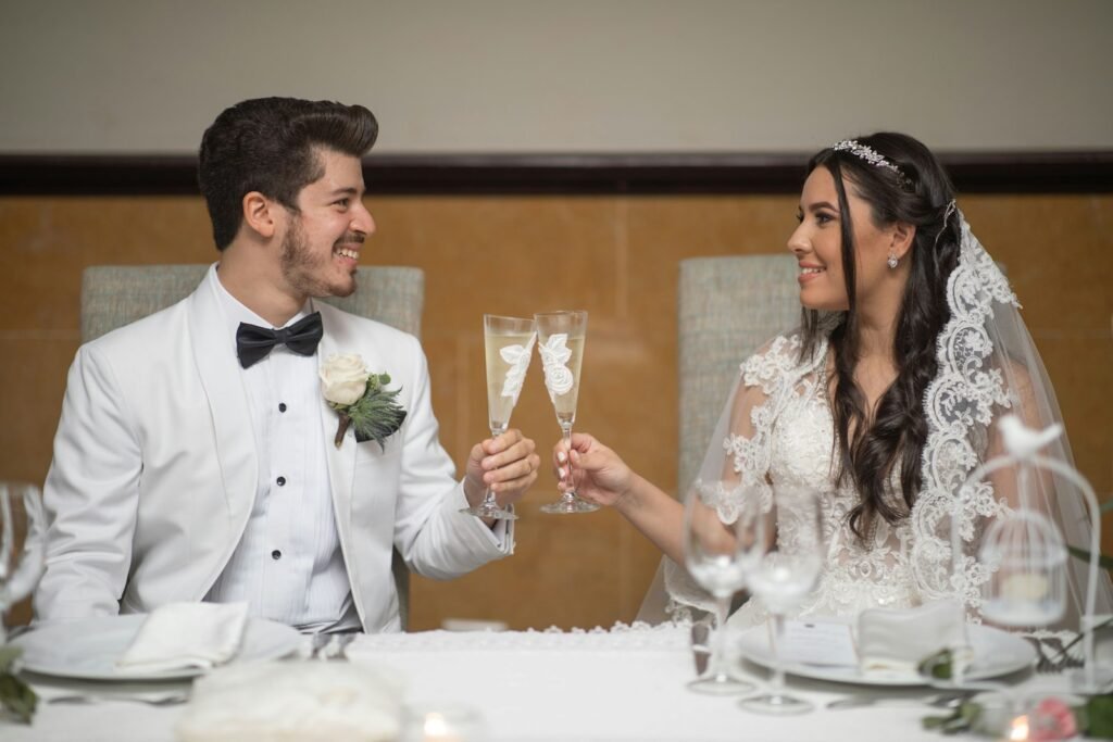 Bride and groom toasting with champagne glasses