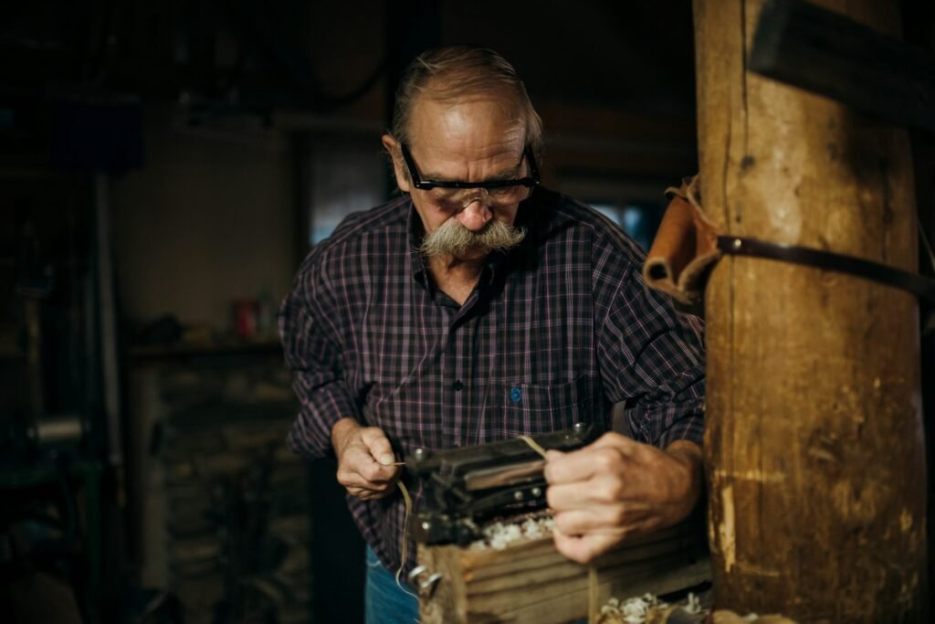 Craftsman working in a small workshop setting