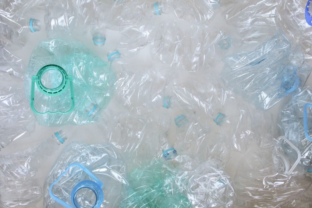Top-view of crushed plastic bottles prepared for recycling