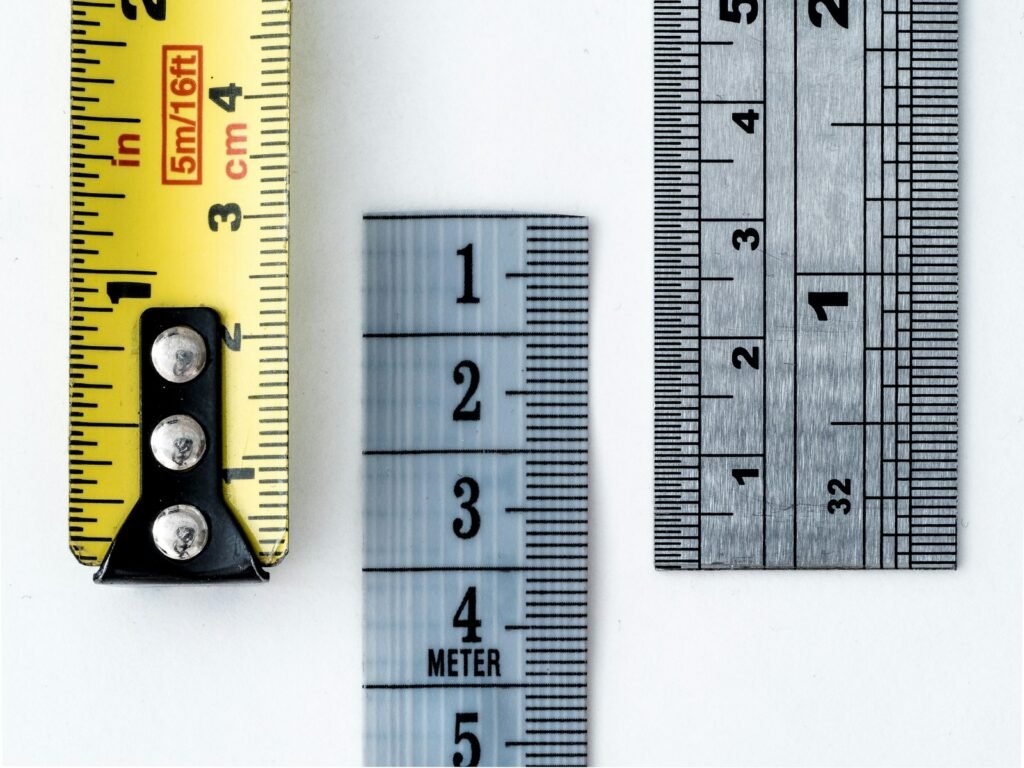 Gray and yellow measuring tools laid out together