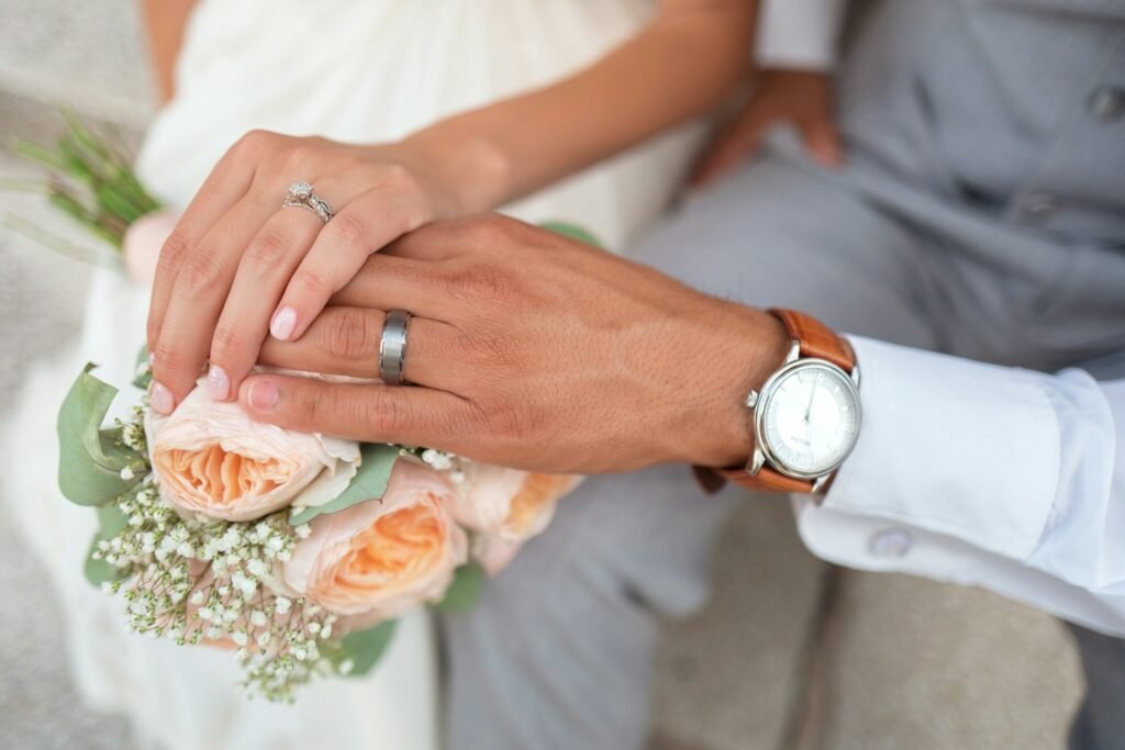 Man and woman holding hands together