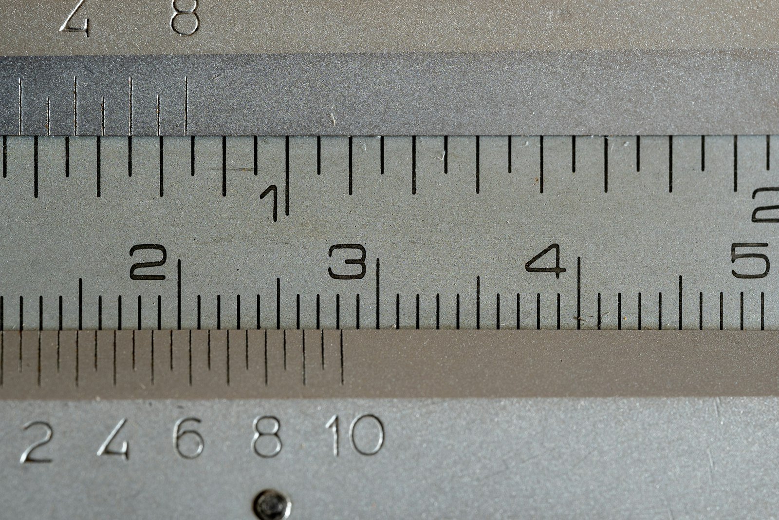 Close-up of a measuring tape showing numbered markings