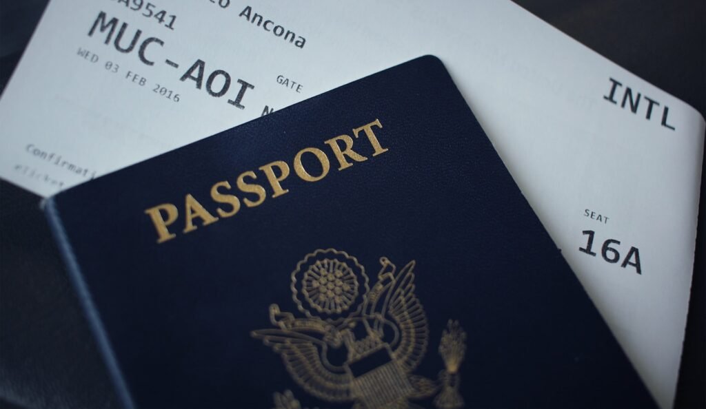 Passport booklet resting on a white surface, ready for travel