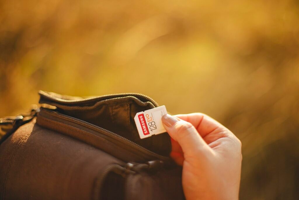 Person holding a price tag while shopping