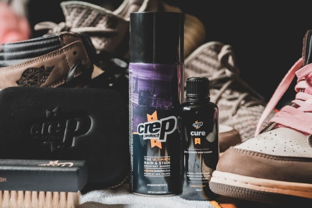 Close-up of a set of various shoe and leather care products