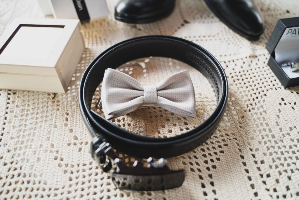A stylish set of men's fashion accessories including a bow tie
