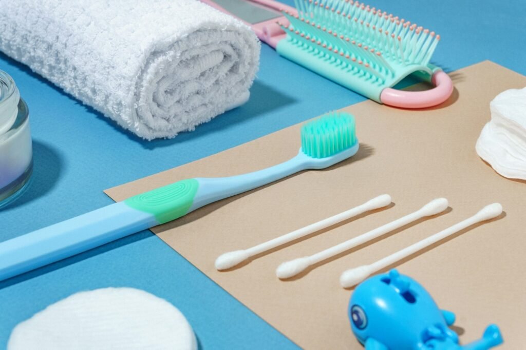 Travel toiletries and grooming essentials laid flat before packing